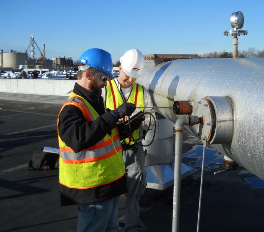 Workers-taking-oxidizer-airflow-measurements